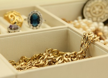 Several pieces of jewelry in a jewelry box