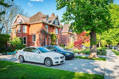 House with cars in Driveway